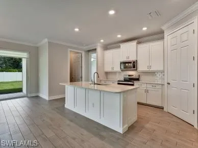 OPENM KITCHEN WITH ISLAND SINK PREP AREA