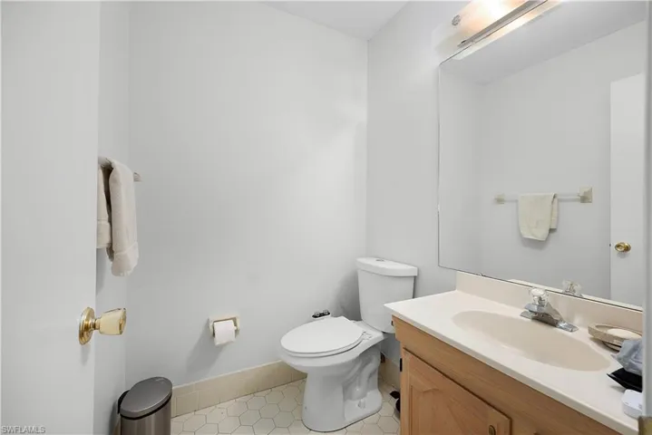 Bathroom with vanity and light tile patterned floors