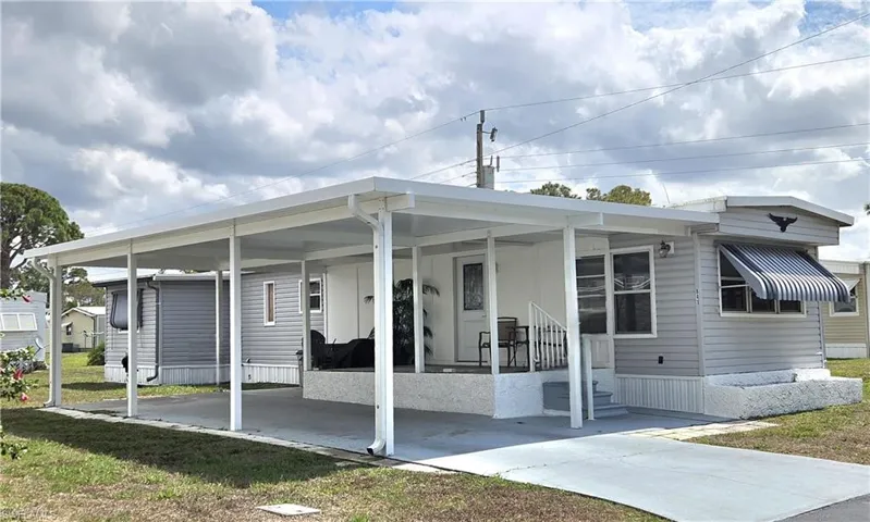Lovely single-wide ideally located at the end of a QUIET street with no through-traffic