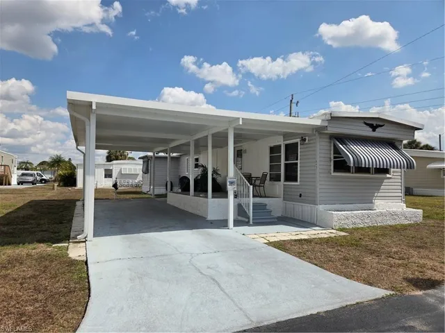 Carport has 3-in. insulation and all 4-in. poles are set in place to erect walls for a Florida Room if the Buyer wishes.