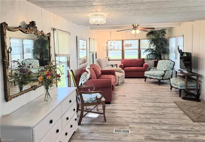 Lovely wood laminate flooring with all new plywood underneath.