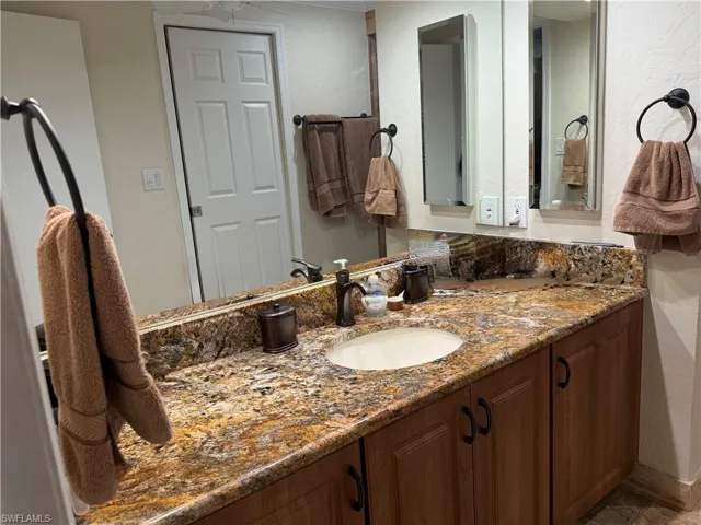 Master with spacious granite countertop