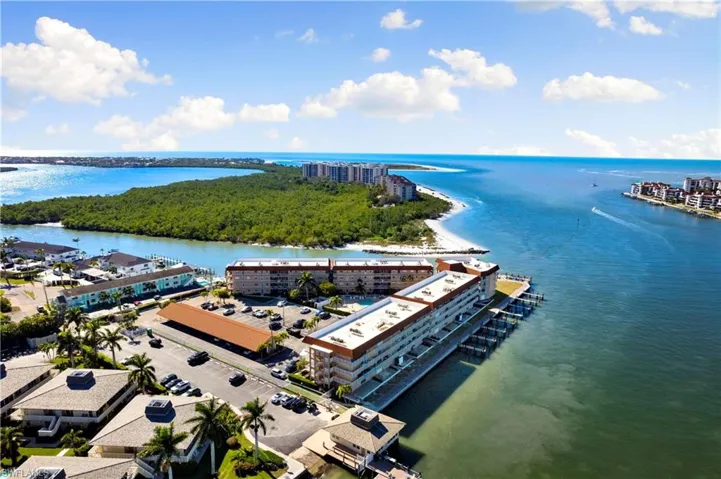 Bird's eye view of a large body of water and apartment complex
