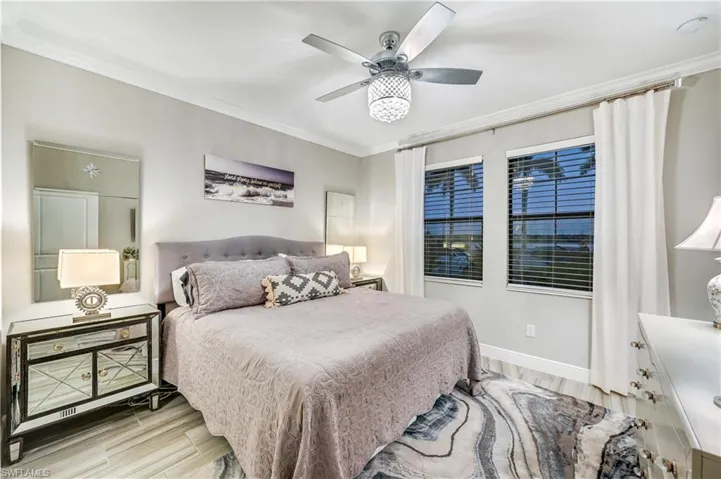 Primary Bedroom with a Lake View