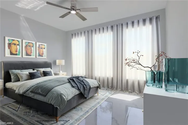 Bedroom featuring multiple windows and ceiling fan