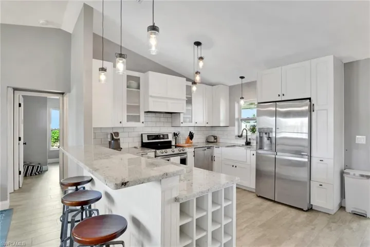 The beautiful kitchen features a coordinating LG appliance package
