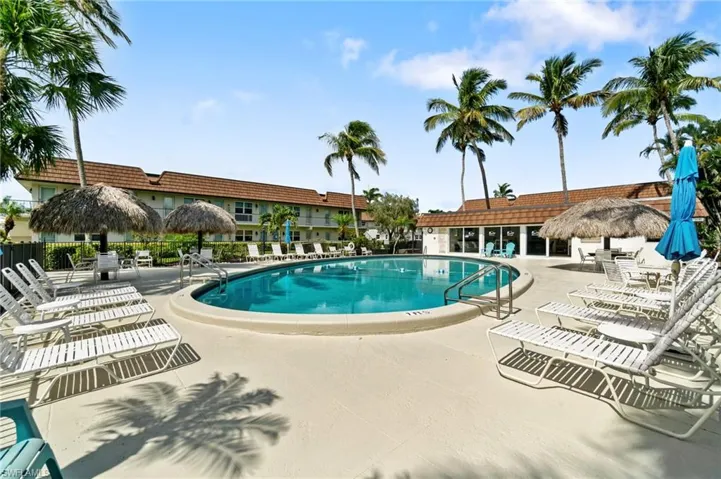 Community pool featuring a patio area
