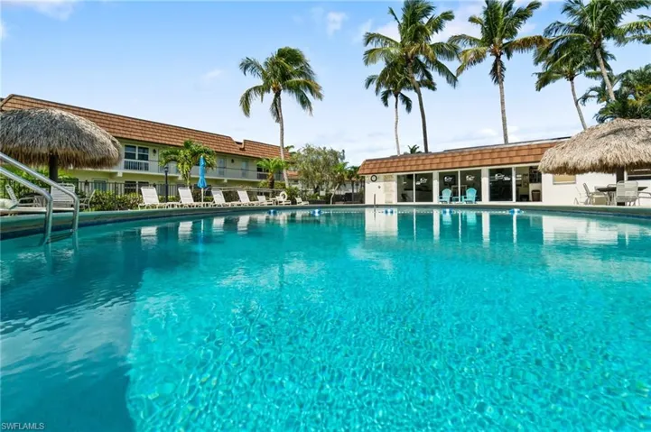 View of community poolCrystal blue community swimming pool right outside your front door
