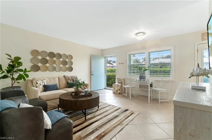 Welcome to your beach retreat! Tons of natural light flows into your living space, but can be filtered by the Plantation Shutters.