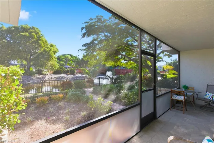 Sunroom with a water view