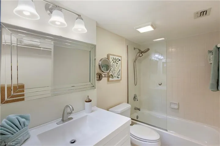 Full bathroom with vanity and bathing tub / shower combination
