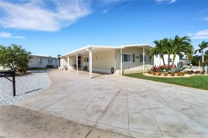 View of front of home featuring a carport