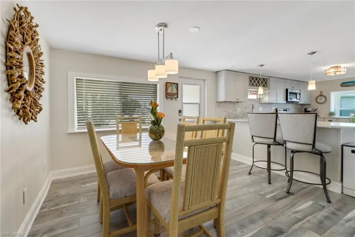 Dining room featuring plenty of natural light and light wood-type flooring