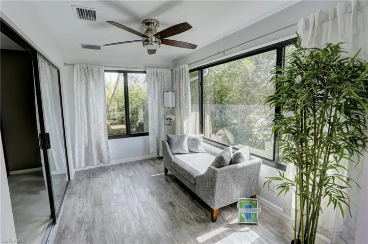 Sunroom with ceiling fan