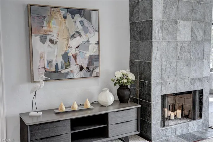 Interior details featuring a tiled fireplace