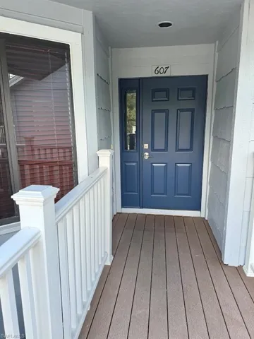 Property entrance featuring a porch