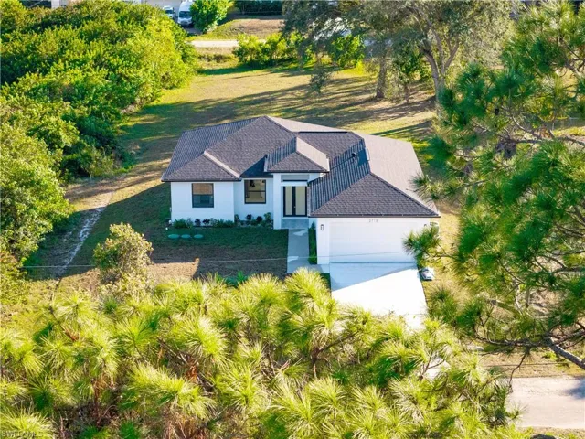 Aerial view of property and surrounding area
