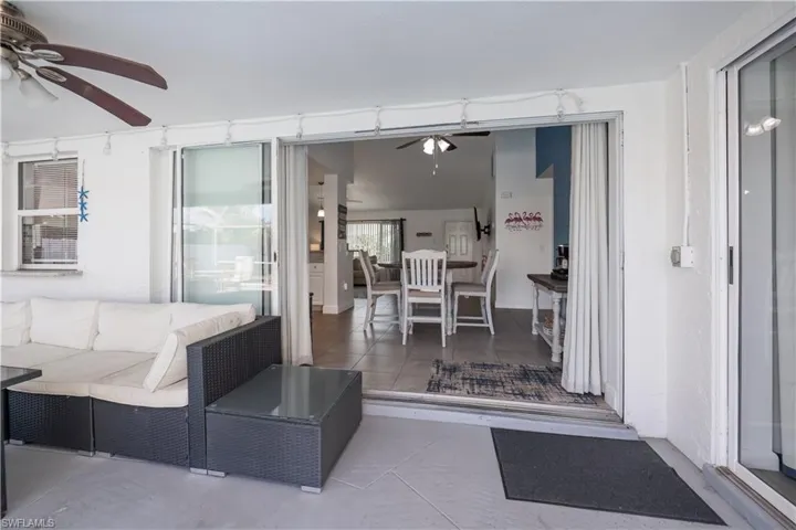 Tiled living area with a ceiling fan