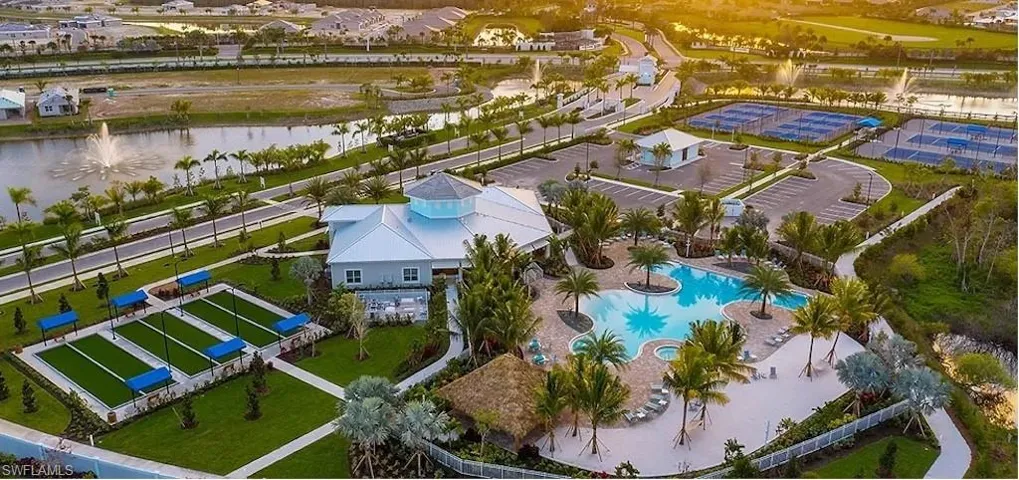 Drone / aerial view of a large body of water and a pool