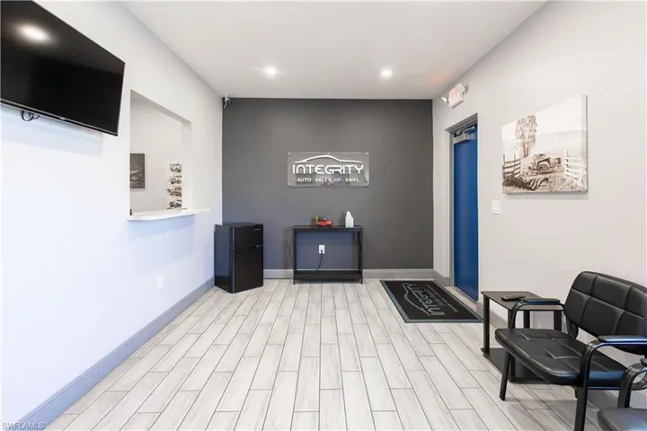 Light wood-finish flooring with a neutral color palette