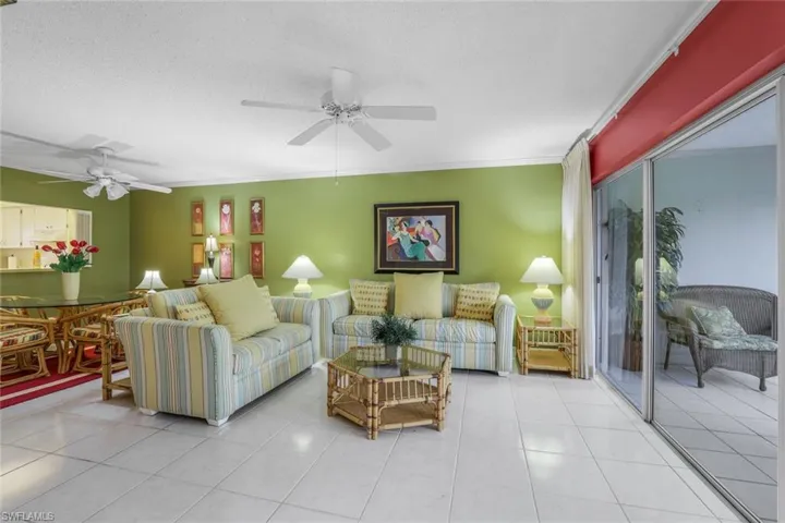Large living room offers an extraordinary view of the Oyster Bay canal and ample space
