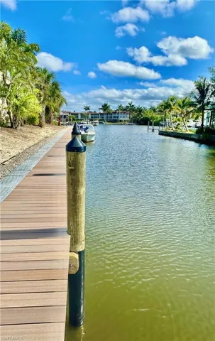 Each unit enjoys a deeded 30' brand new dock (2025) with direct access to Naples Bay