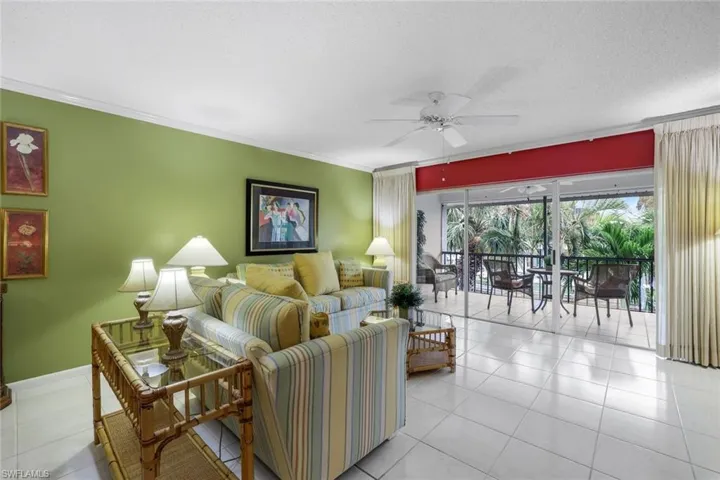 The expansive living room offers an abundance of natural light and room to relax