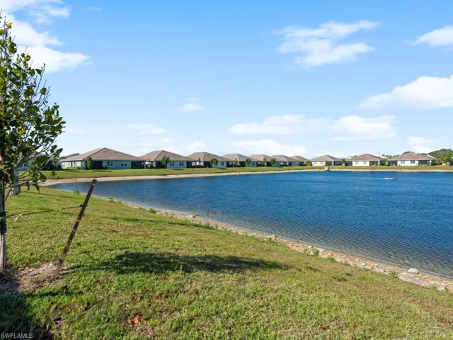 Property view of water with a residential view
