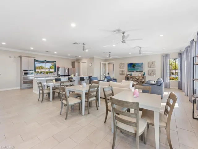 Dining area with ceiling fan, ornamental molding, visible vents, and recessed lighting