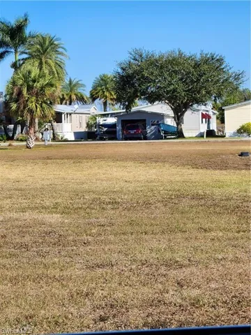 View of yard featuring a garage