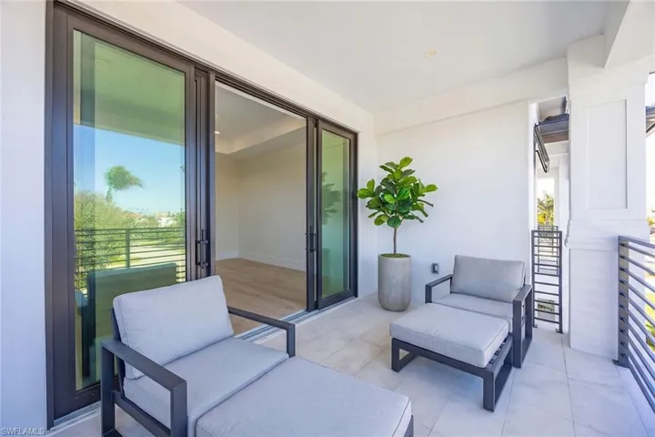 Virtually Staged. Balcony off bedroom