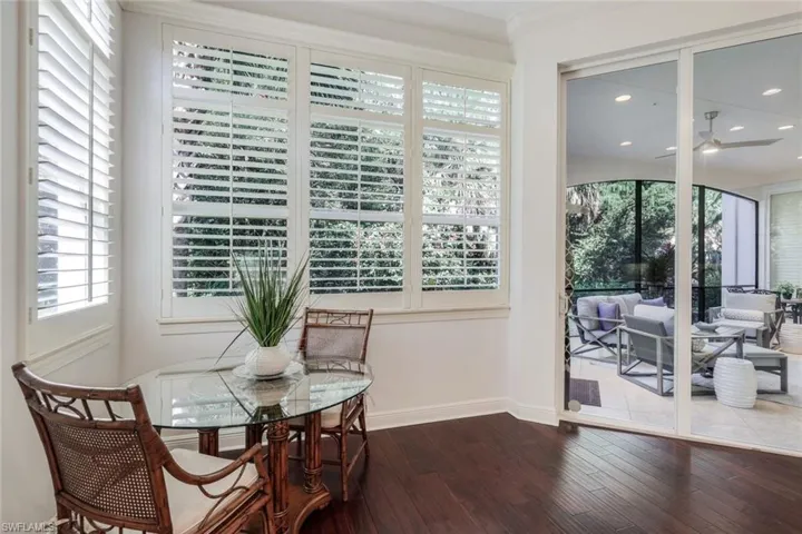 Dining area featuring ceiling fan and hardwood / wood-style flooring