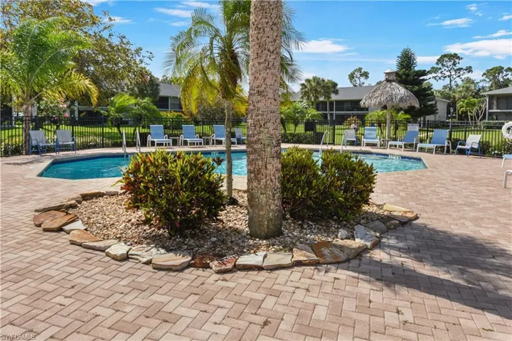 Community pool featuring a patio area