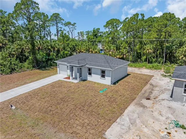 Single story home with a garage