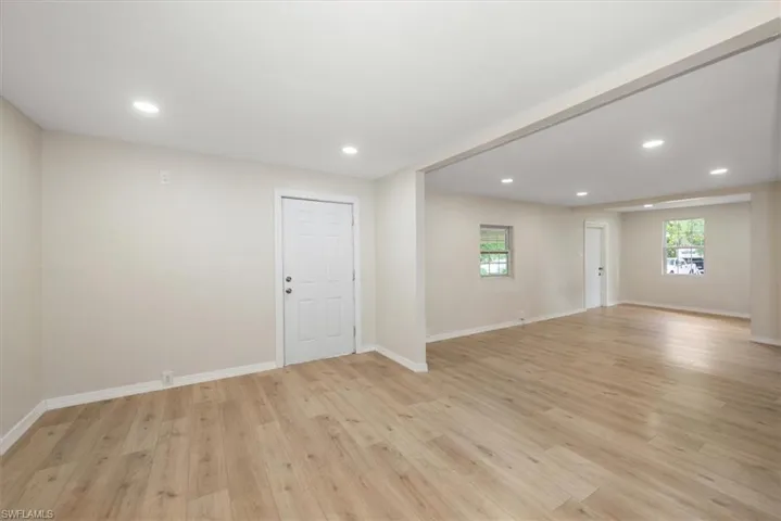 Dining area with view of family room and entry,