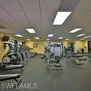 Gym with a paneled ceiling