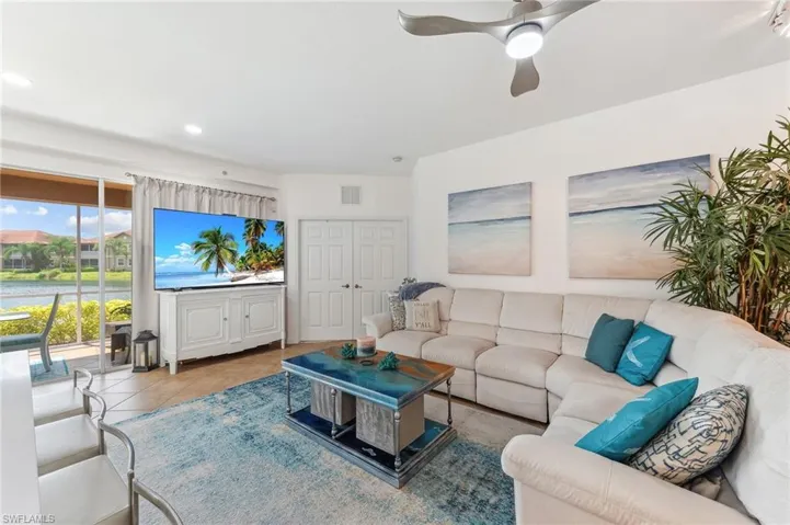 Tiled living room with ceiling fan