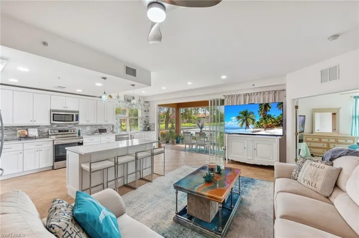 Living room featuring ceiling fan