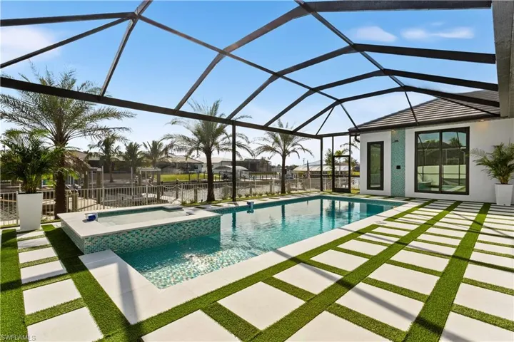 OUTDOOR SHOWER with TILED WALL & CABANA POOL HALF BATHROOM for added CONVENIENCE & STYLE!