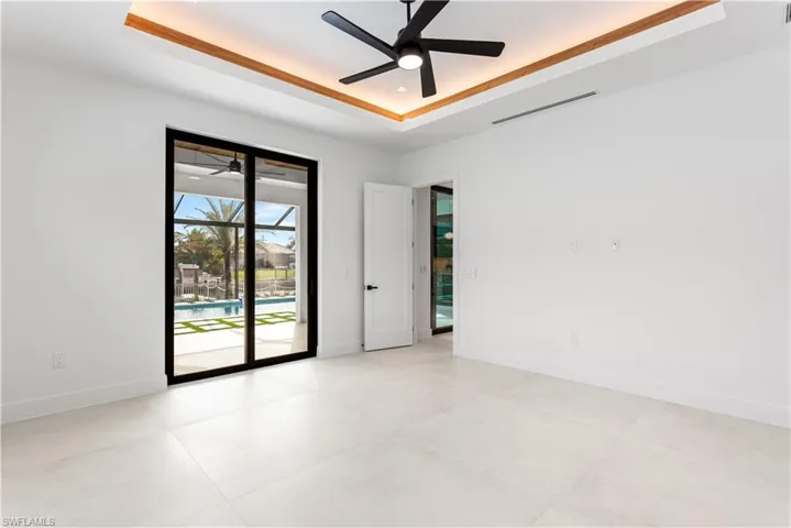 Spacious master bedroom with sliding doors to outdoor oasis!