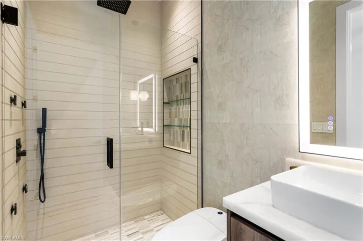 2nd Master Bathroom with rainfall shower, four jets and hand-held shower heads!