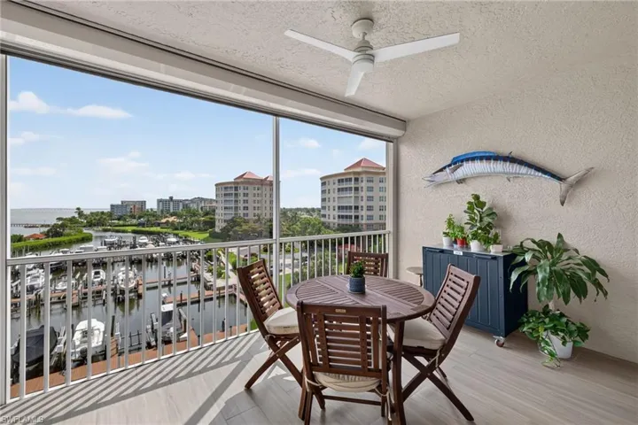 Screened patio with hurricane shades.