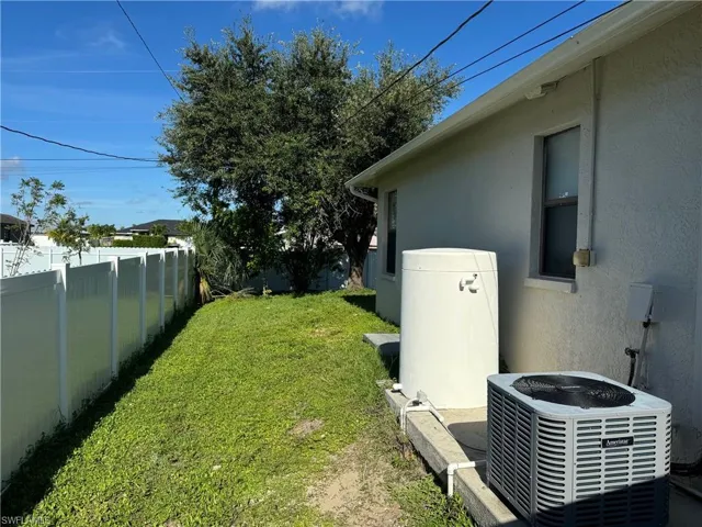 View of yard with central air condition unit