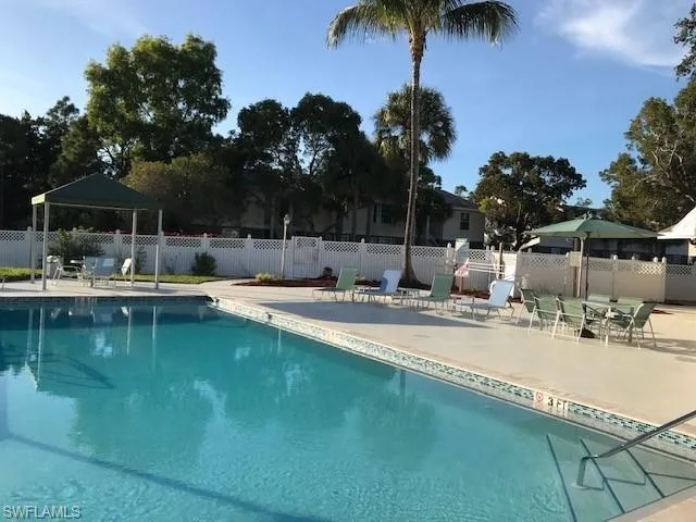 View of swimming pool with a patio area and a gazebo