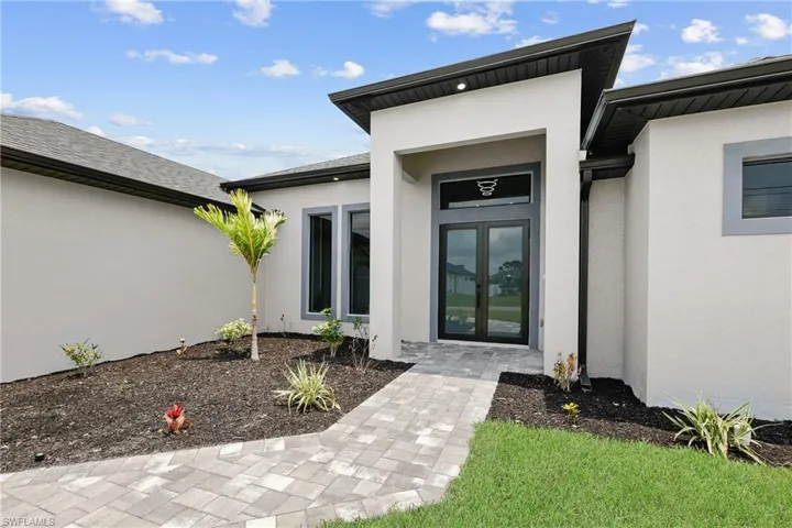 Entrance to property with french doors