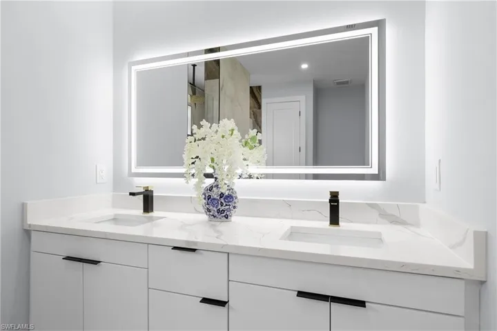 Bathroom featuring double vanity