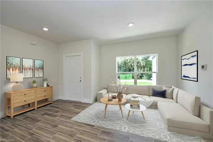 Living room featuring hardwood / wood-style flooring
