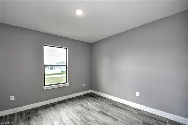 Empty room featuring light hardwood / wood-style flooring