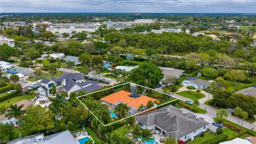 Aerial perspective of suburban area with property parcel outlined