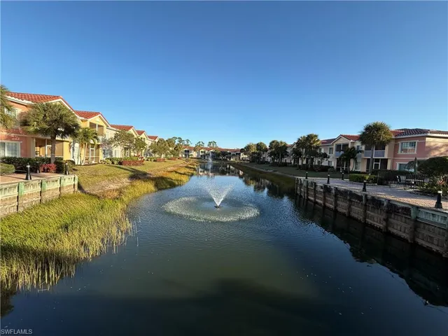 Water view featuring nearby suburban area